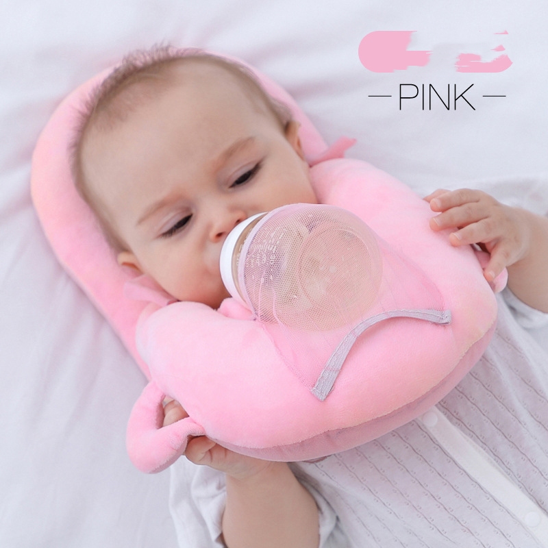 ខ្នើយអោយបេបីបៅទឹកដោះគោ