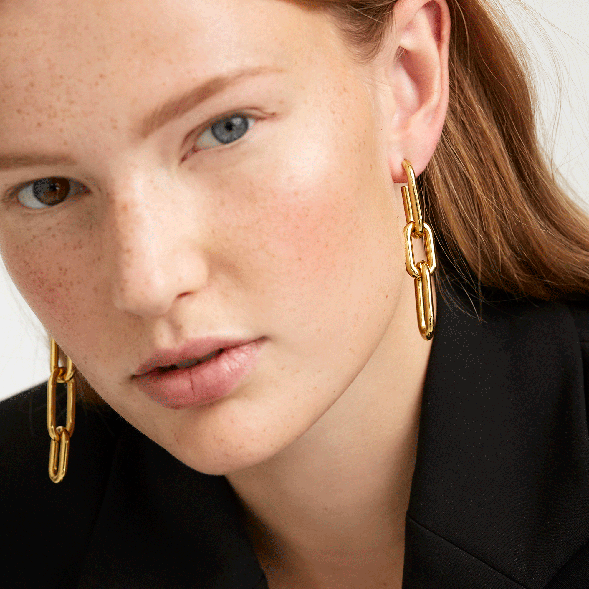 Muze gold earrings